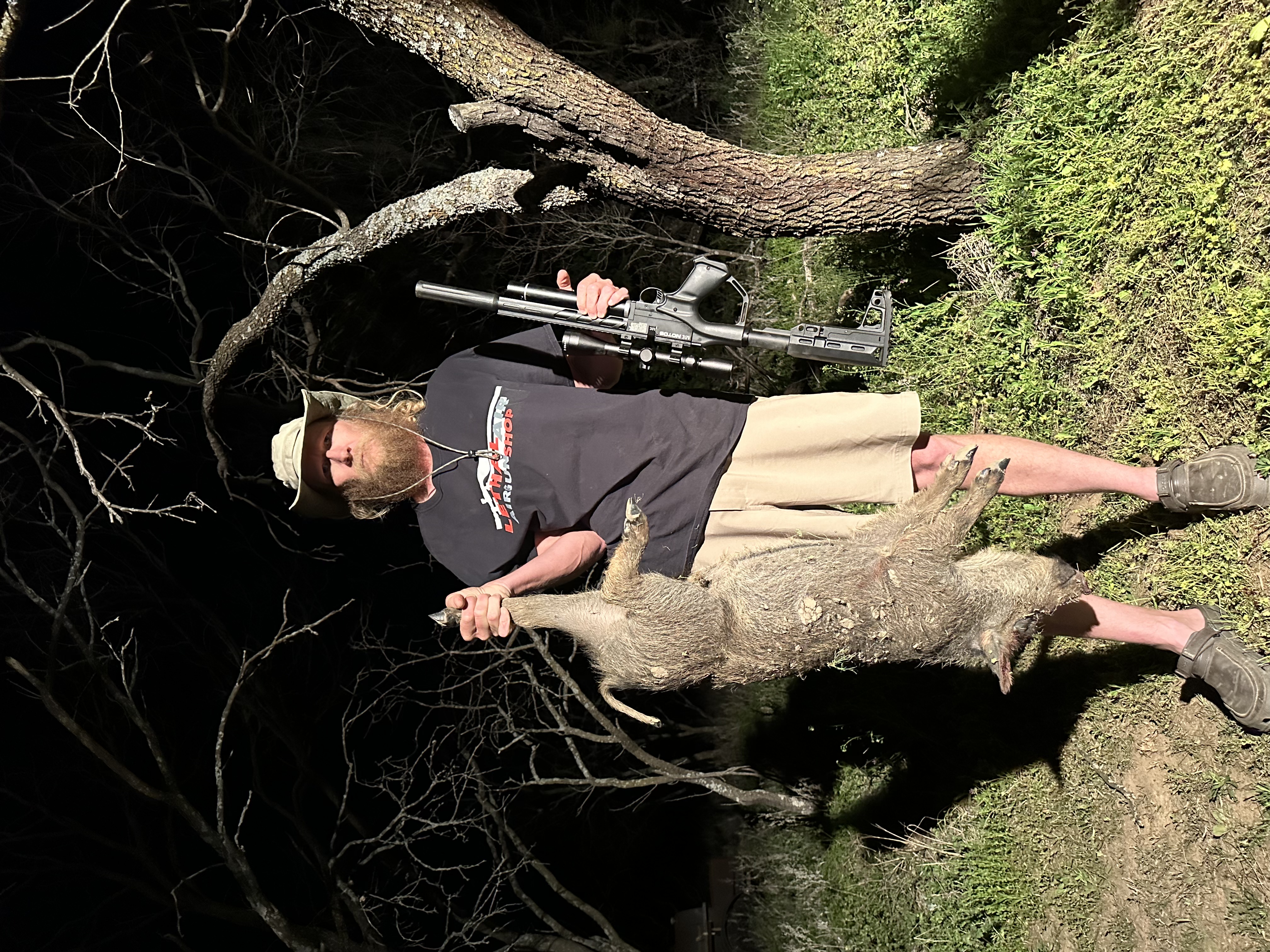 Chris Cook with a 35 pound wild hog harvested with the Umarex Notos